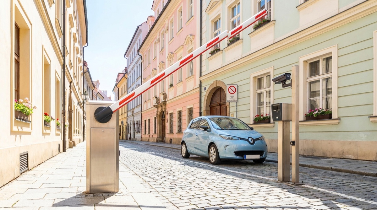 A parking barrier with an ANPR pillar at the narrow entrance to Židovská street, faster and smoother than the hydraulic bollard.